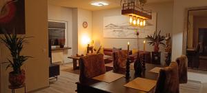 a dining room with a table and chairs at Casa Pura Vida in Rees