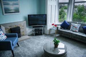 Sjónvarps- og/eða afþreyingartæki á Home in Dunoon Argyll and Bute