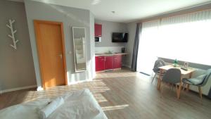 Μια τηλεόραση ή/και κέντρο ψυχαγωγίας στο boardinghouse Kappeln by team SchleiFee