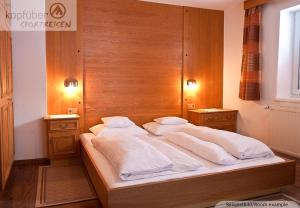 Postel nebo postele na pokoji v ubytování Sporthotel Bergheim
