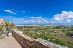 a view from the wall of the city of jerusalem at The Xara Palace Relais & Chateaux in Mdina
