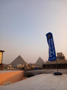 Imagem da galeria de New pyramids way em Cairo