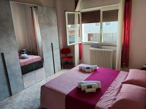 Ένα ή περισσότερα κρεβάτια σε δωμάτιο στο Abbiategrasso Relax by Holiday World