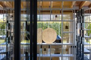 a room with a window with a chair in it at Hotel San Teodoro in San Teodoro