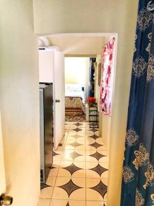 a hallway with a room with a hallwayngth at Chill Spot in Old Harbour in Old Harbour +9 photos