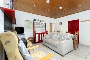 TV a/nebo společenská místnost v ubytování Cottage 194 - Leenane