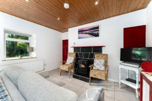 TV a/nebo společenská místnost v ubytování Cottage 194 - Leenane