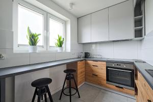 Køkken eller tekøkken på CityCenterApartments-Kar4