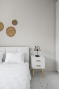 Posteľ alebo postele v izbe v ubytovaní Aelia Apartments, The Luxury Suites