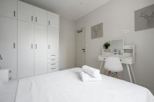 Posteľ alebo postele v izbe v ubytovaní Aelia Apartments, The Luxury Suites