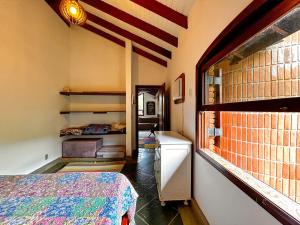 Giường trong phòng chung tại Casa a 180m da Praia do Toque Toque Pequeno SP