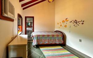 Giường trong phòng chung tại Casa a 180m da Praia do Toque Toque Pequeno SP +35 ảnh
