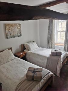 Ένα ή περισσότερα κρεβάτια σε δωμάτιο στο Rowel House +23 φωτογραφίες