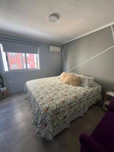 Postel nebo postele na pokoji v ubytování Apart Uruguay