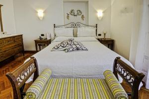 Posteľ alebo postele v izbe v ubytovaní Casa Mariannina