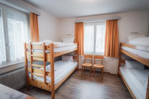 Postel nebo postele na pokoji v ubytování B&B Haus Schönstatt contactless- Check-In + 11 fotografií