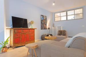 Et tv og/eller underholdning på TOP location 2 bedroom groundfloor home with garden