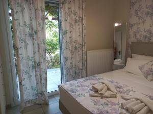 Posteľ alebo postele v izbe v ubytovaní Rania-apartments 2