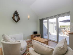 Posezení v ubytování Singletree Cottage