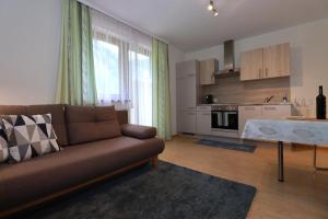 A kitchen or kitchenette at Appartement Dallavia