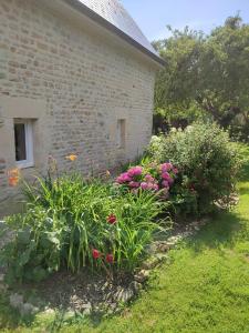 Zahrada ubytování Gîte Bienvenue chez Naty