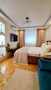 Postel nebo postele na pokoji v ubytování Jacuzzi Life