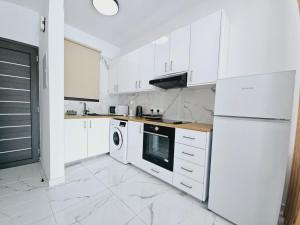 Kuchyň nebo kuchyňský kout v ubytování Sea Side Appartment in Kato Paphos