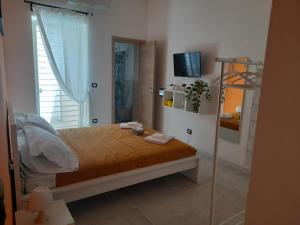 Postel nebo postele na pokoji v ubytování Nonno Rocco Guest House