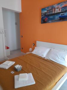 Postel nebo postele na pokoji v ubytování Nonno Rocco Guest House
