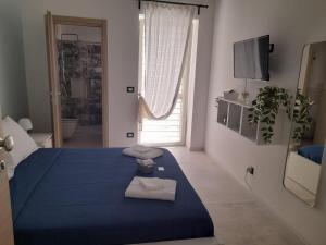 Postel nebo postele na pokoji v ubytování Nonno Rocco Guest House