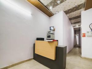 TV a/nebo společenská místnost v ubytování Hotel O Iris Lite