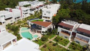 an aerial view of a city with buildings and a pool at Moderno Apartamento Frente Al Mar in La Iglesia