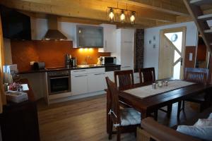 Kuchyň nebo kuchyňský kout v ubytování Appartment Kainhofer
