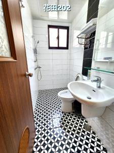 Kopalnica v nastanitvi Huatian B&B