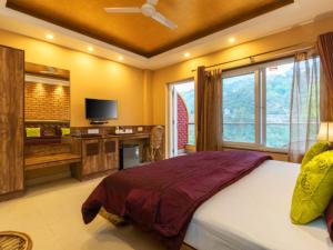 Voodi või voodid majutusasutuse Nirvana Mussoorie toas