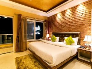 Voodi või voodid majutusasutuse Nirvana Mussoorie toas
