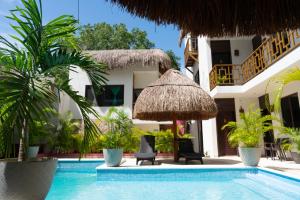 Bazén v ubytování Hotel Diosa del Agua Bacalar nebo v jeho okolí