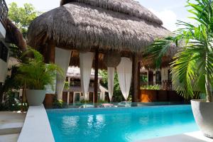 Bazén v ubytování Hotel Diosa del Agua Bacalar nebo v jeho okolí