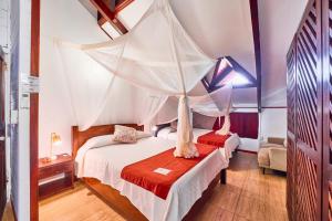 Voodi või voodid majutusasutuse Hotel El Encanto toas