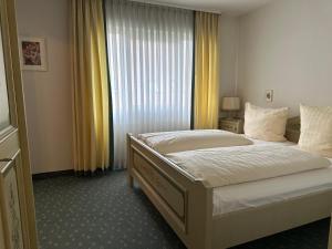 Voodi või voodid majutusasutuse Hotel Graßer toas