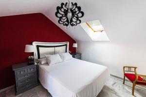 Postel nebo postele na pokoji v ubytování La Buhardilla de Olivia