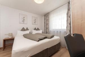 Posteľ alebo postele v izbe v ubytovaní Appartement Gehörde-Sölden inklusive Summercard