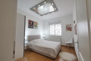 Ένα ή περισσότερα κρεβάτια σε δωμάτιο στο Apartman Marija