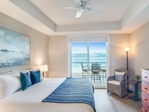 a bedroom with a bed and a view of the ocean at Seasons at Sandpoint - Managed by Elite Alliance in Sandpoint +243 photos