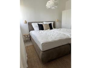 Ένα ή περισσότερα κρεβάτια σε δωμάτιο στο Hennesee Chalet Comfortable holiday residence