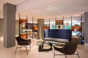 Posezení v ubytování Le Meridien Visconti Rome