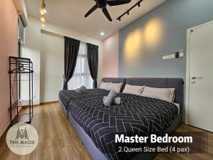 a bedroom with a bed and a ceiling fan at The Cove Hillside Residence Ipoh - Tranquility Vibes in Ipoh +22 photos