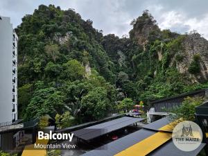 a mountain view from the balcony of a building at The Cove Hillside Residence Ipoh - Tranquility Vibes in Ipoh