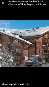a picture of a building with snow on the roof at Villars SWISS Alpes in Villars-sur-Ollon