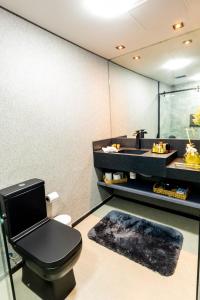 Flat com lazer, Wi-Fi e otima localizacao的休息区